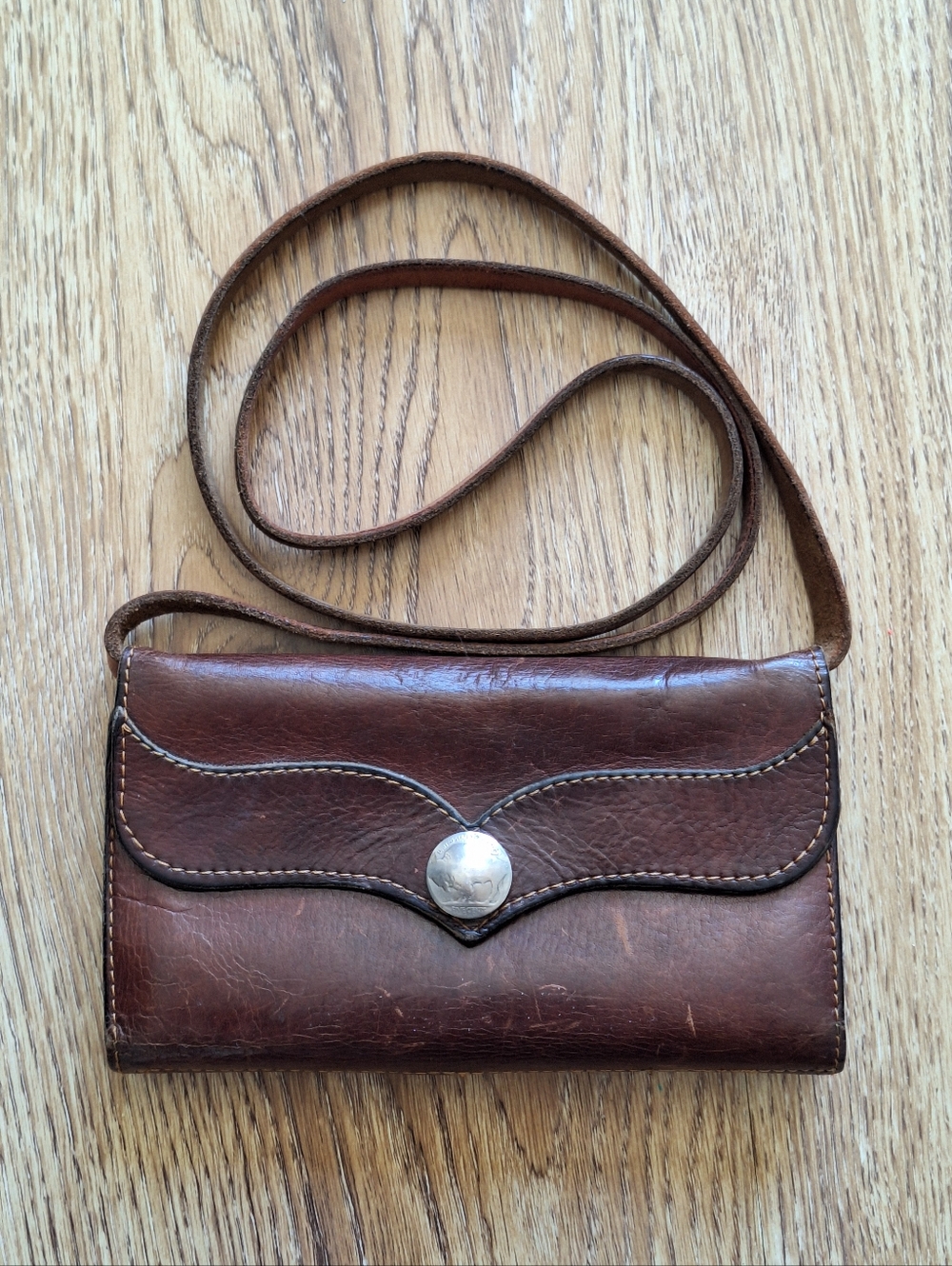 Vintage Brown Leather Crossbody Bag with Buffalo Nickel Closure